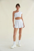 Mini-jupe de tennis évasée et lissante Avery en blanc