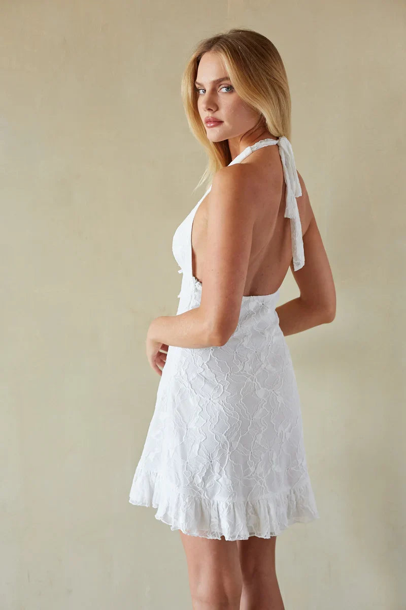Mini-robe fleurie à volants et dos nu en dentelle