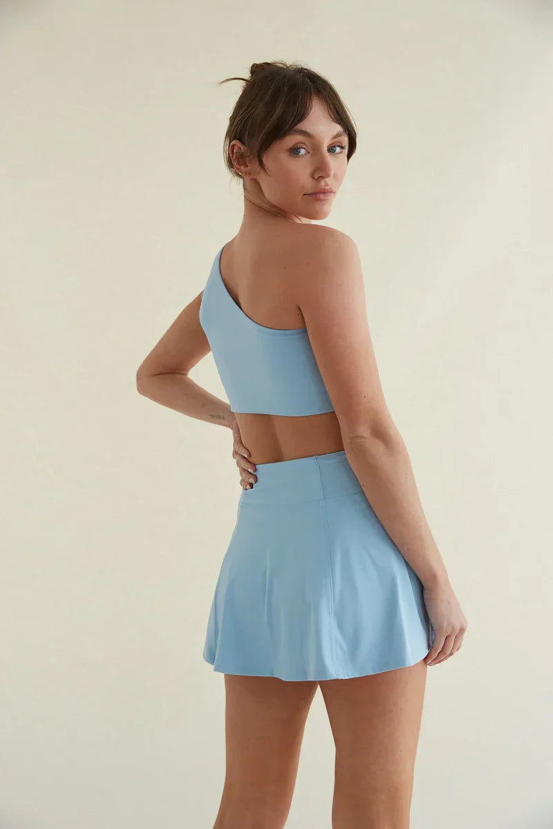 Jupe-short de tennis Avery Smoothing Flare en bleu