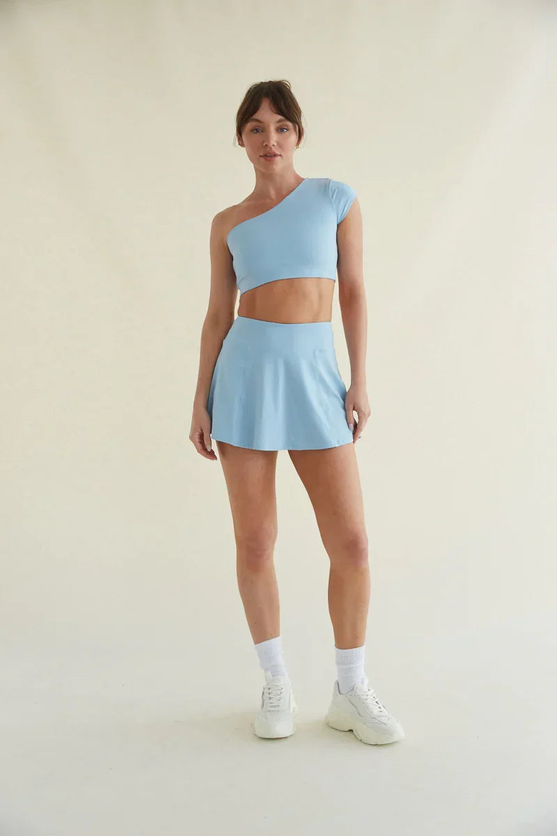 Jupe-short de tennis Avery Smoothing Flare en bleu