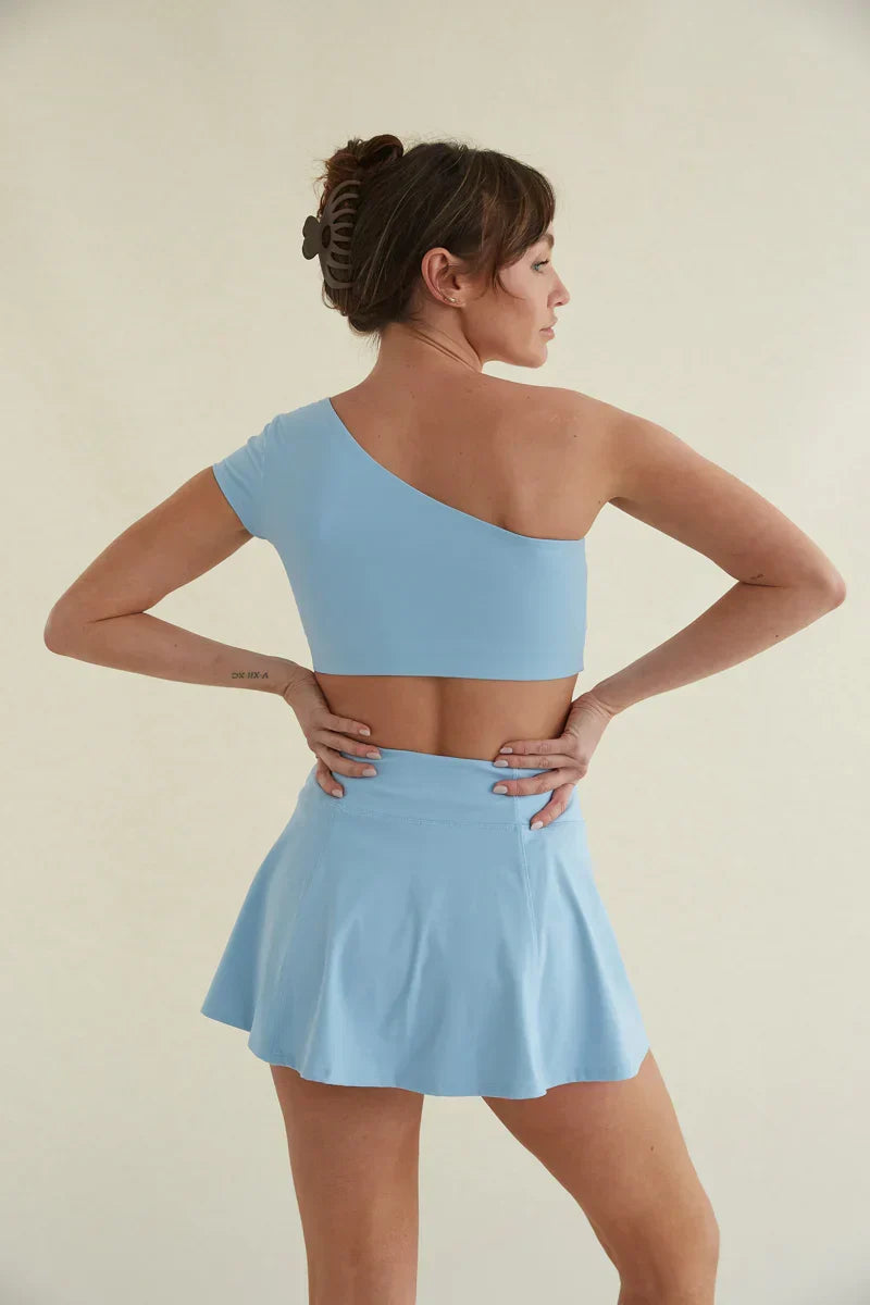 Haut court asymétrique Mia Smoothing bleu
