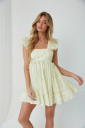 Mini-robe babydoll Cara à œillets fleuris et manches papillon