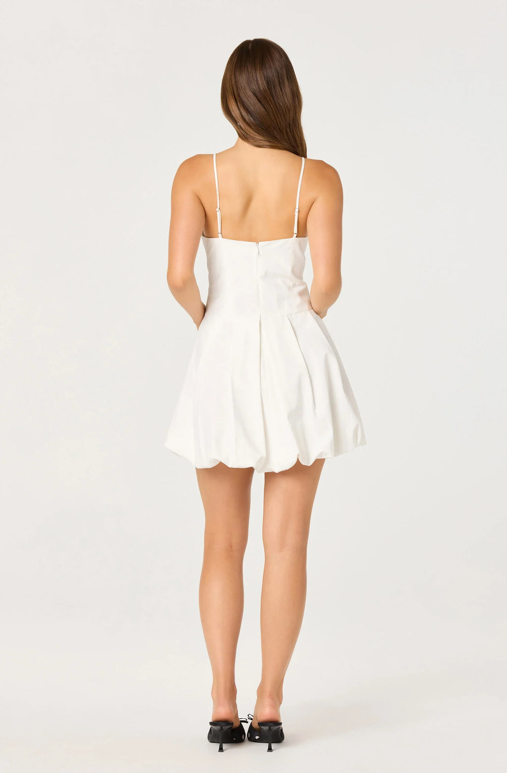 Robe Tionna courte à col tablier, ornée d'un nœud et à la coupe "bubble"